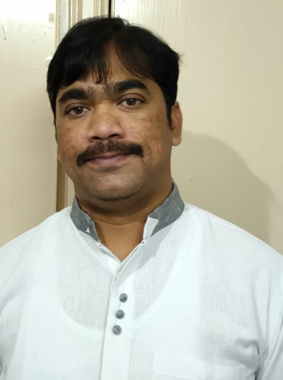Portrait of Dr. Praveen Kumar